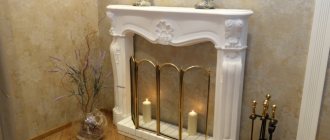 Small fake fireplace with candles
